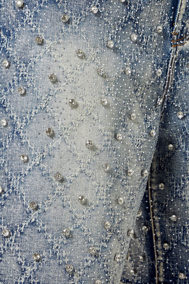 Fashion-forward aqua blue shorts showcasing hand-applied embellishments, distressed accents, perfect for summer outings