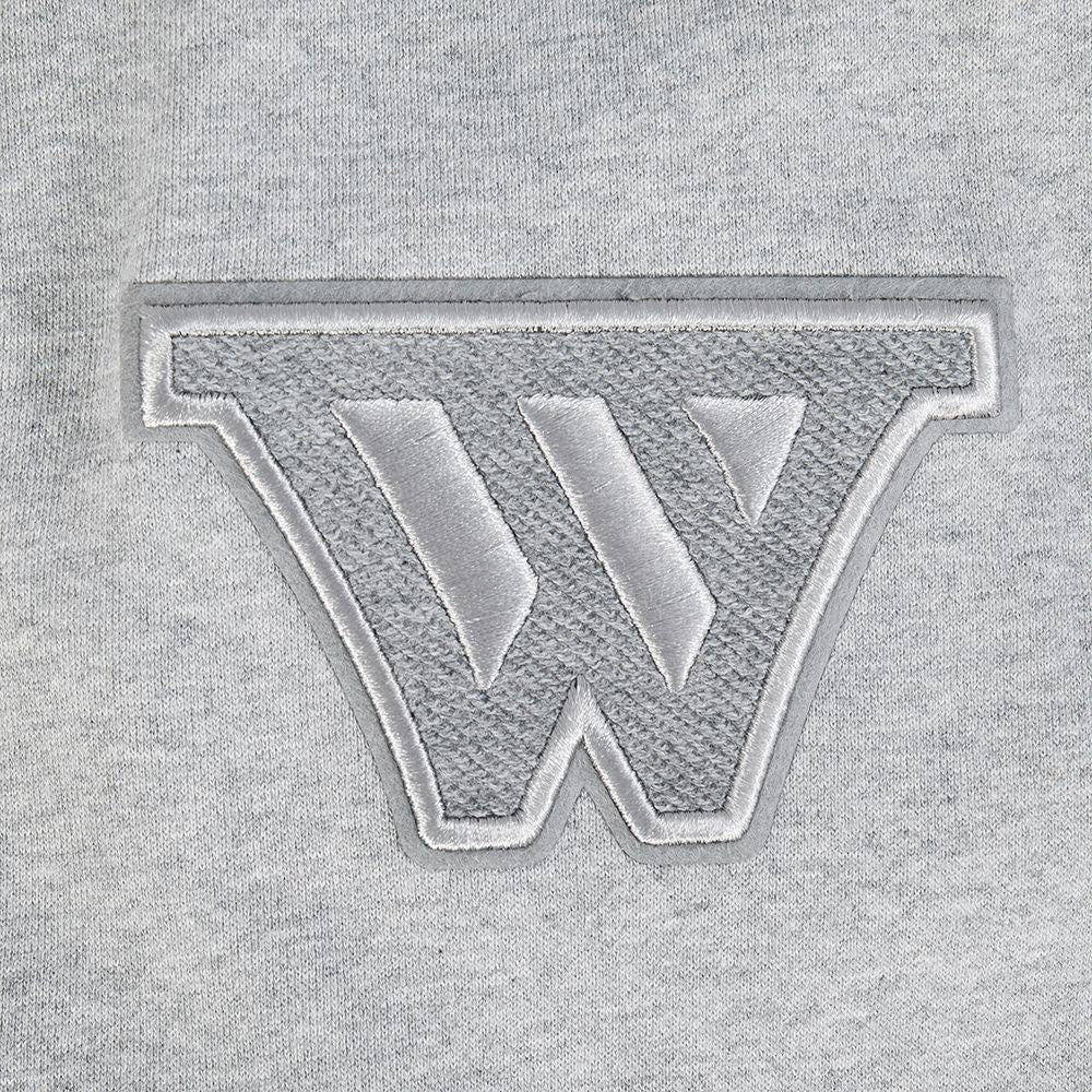 Full-length view of the pullover hoodie showcasing the relaxed fit and color palette of black, grey, and eggshell