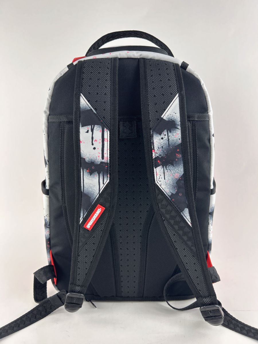 Backpack showcasing Joker-inspired shark mouth graphic with spacious compartments and eco-friendly 900D polyester fabric
