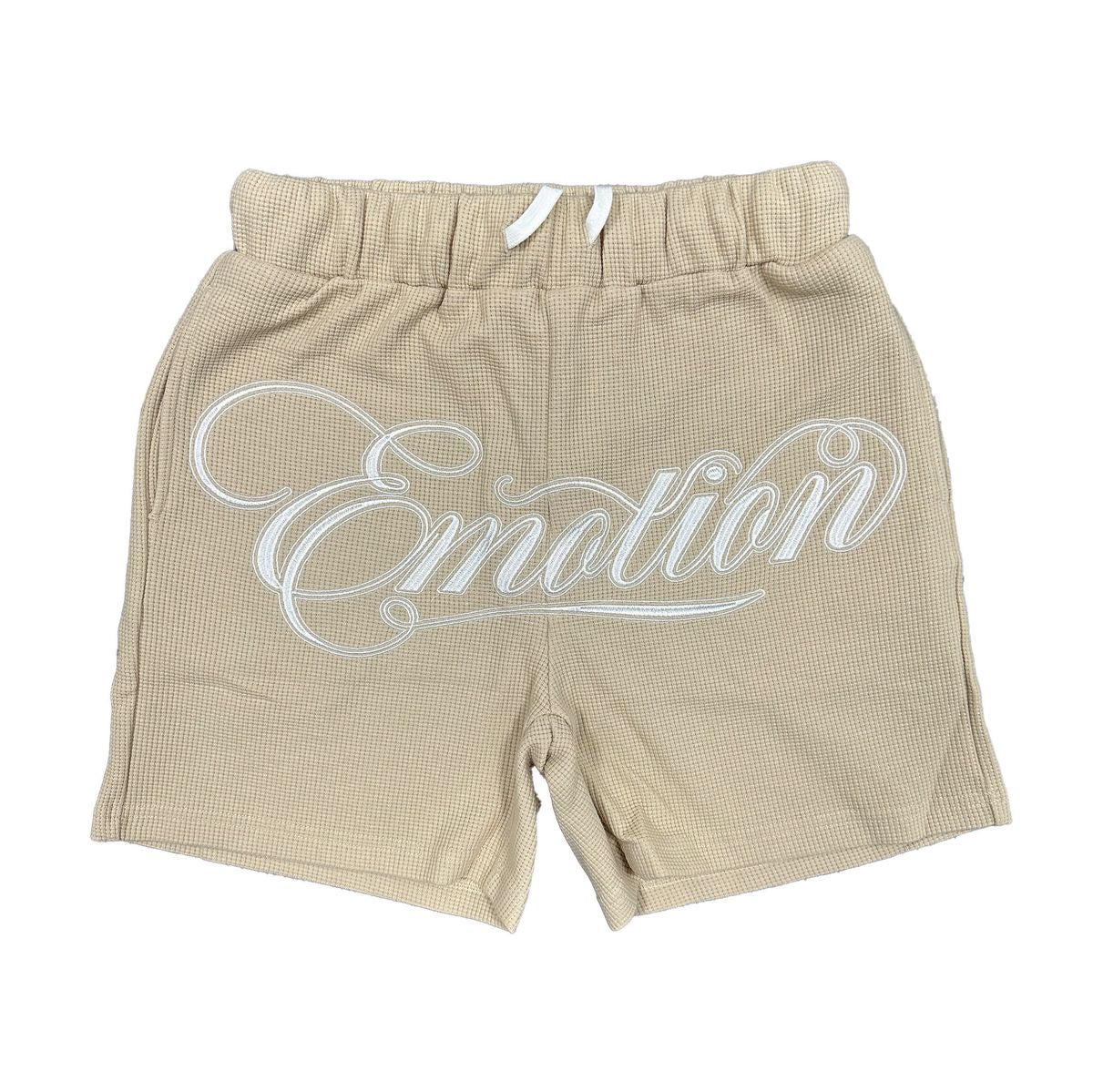 Fashionable cream colored shorts with unique and stylish design