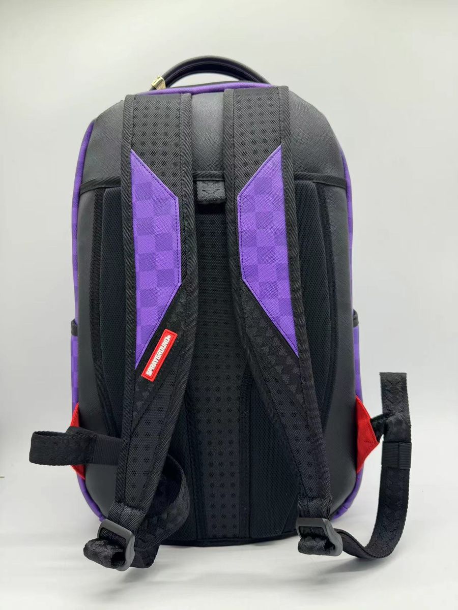 Front view of Sprayground B7645 backpack highlighting its 18-inch height and unique shark-themed artwork