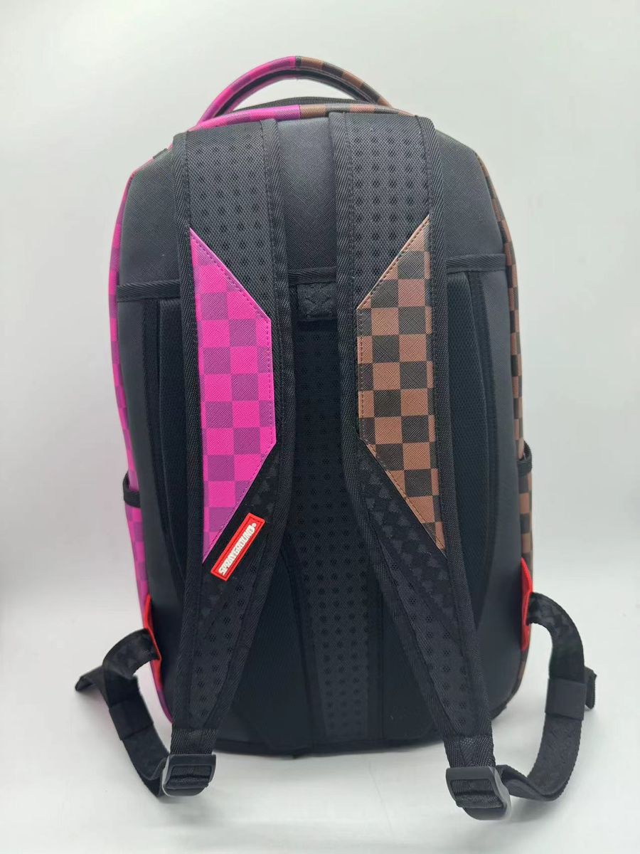 Side angle of the Sprayground Split Sip backpack displaying its 65-inch depth and practical size for everyday use