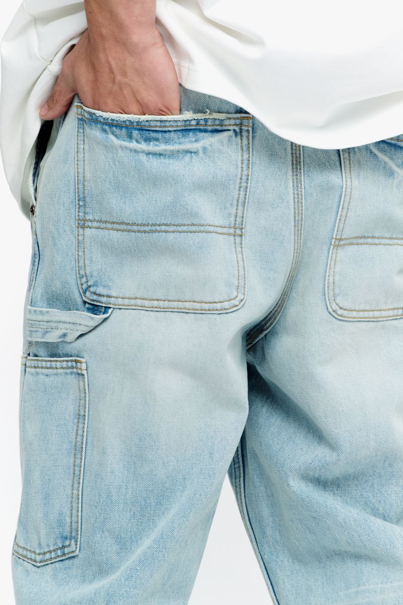 Back view of Valabasas Mr Straight light blue wash denim jeans displaying back pockets and fit