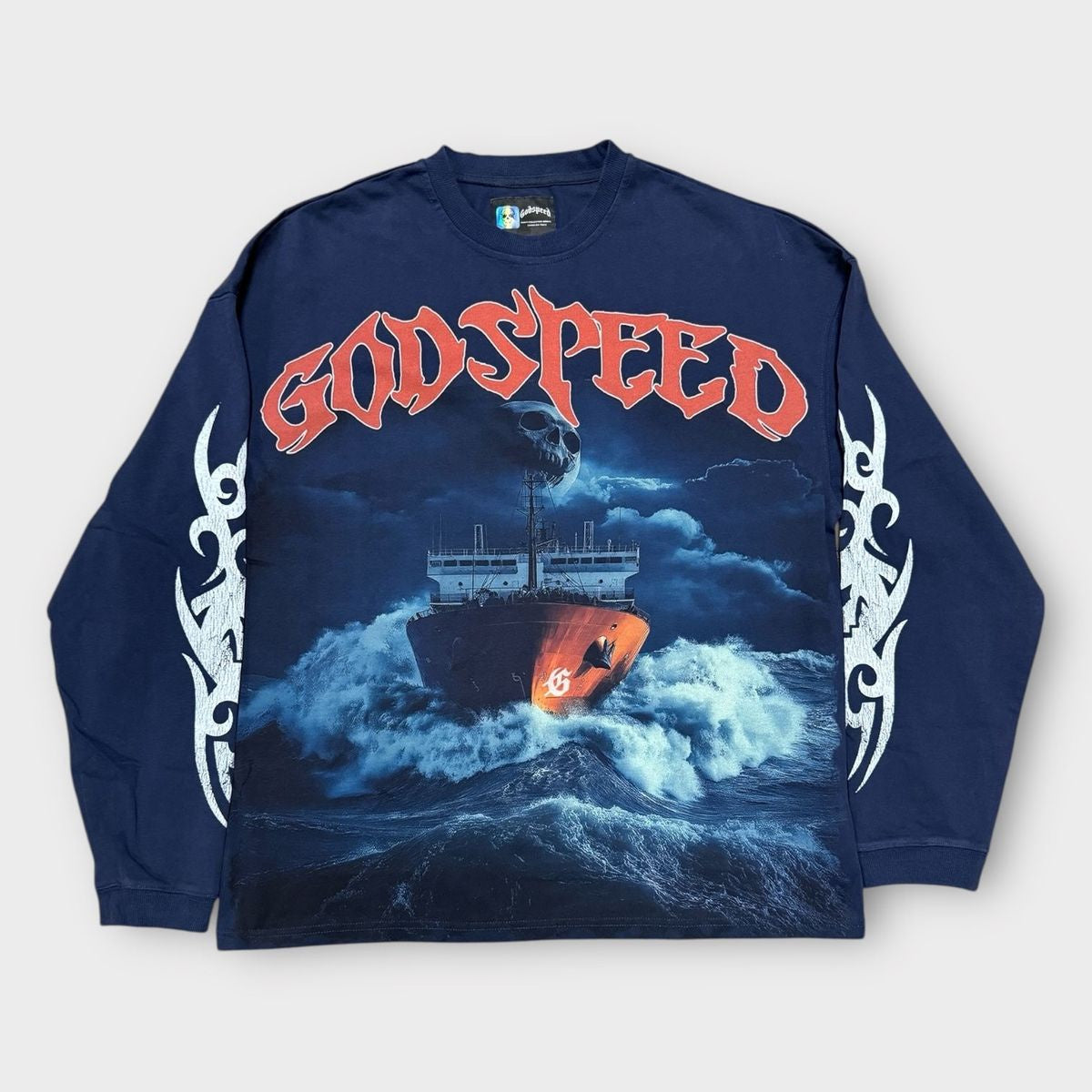 Rugged navy long sleeve T-shirt featuring a detailed maritime artwork and crown embellishments