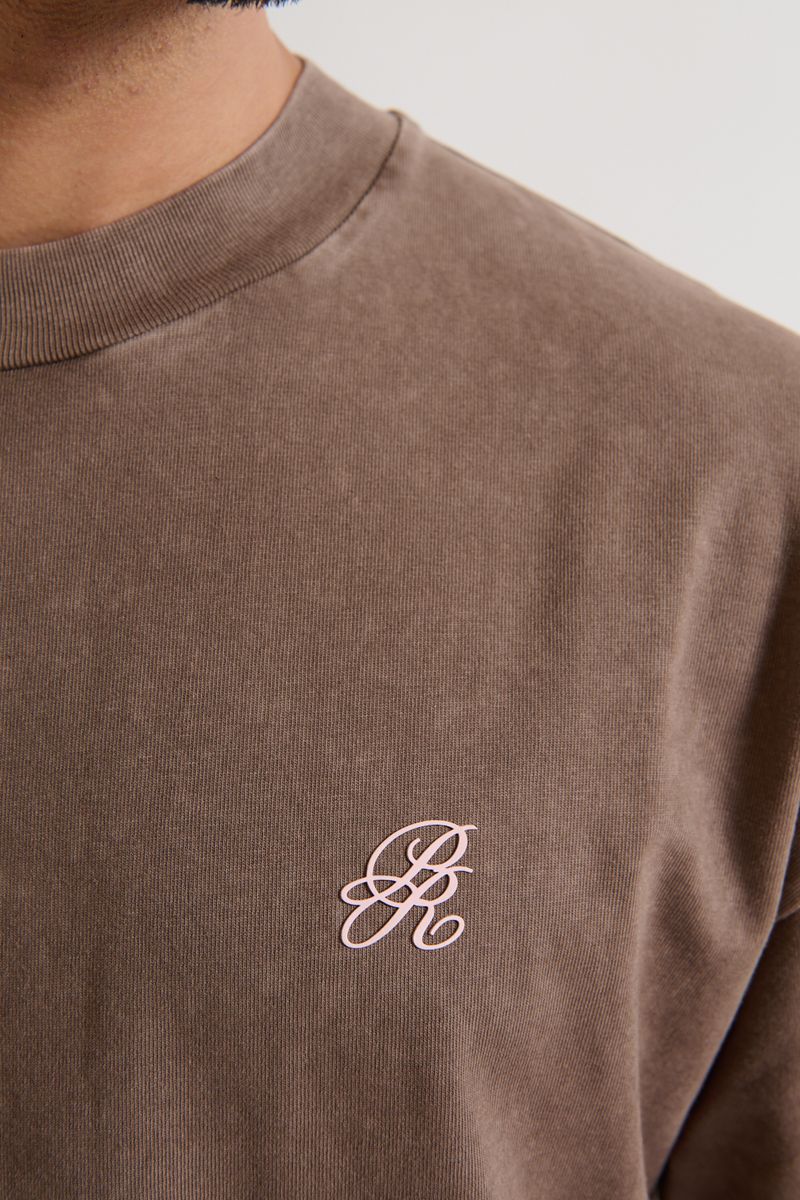 Side angle of PURE Monclair Brown Tee emphasizing its relaxed oversized cut and comfortable fit