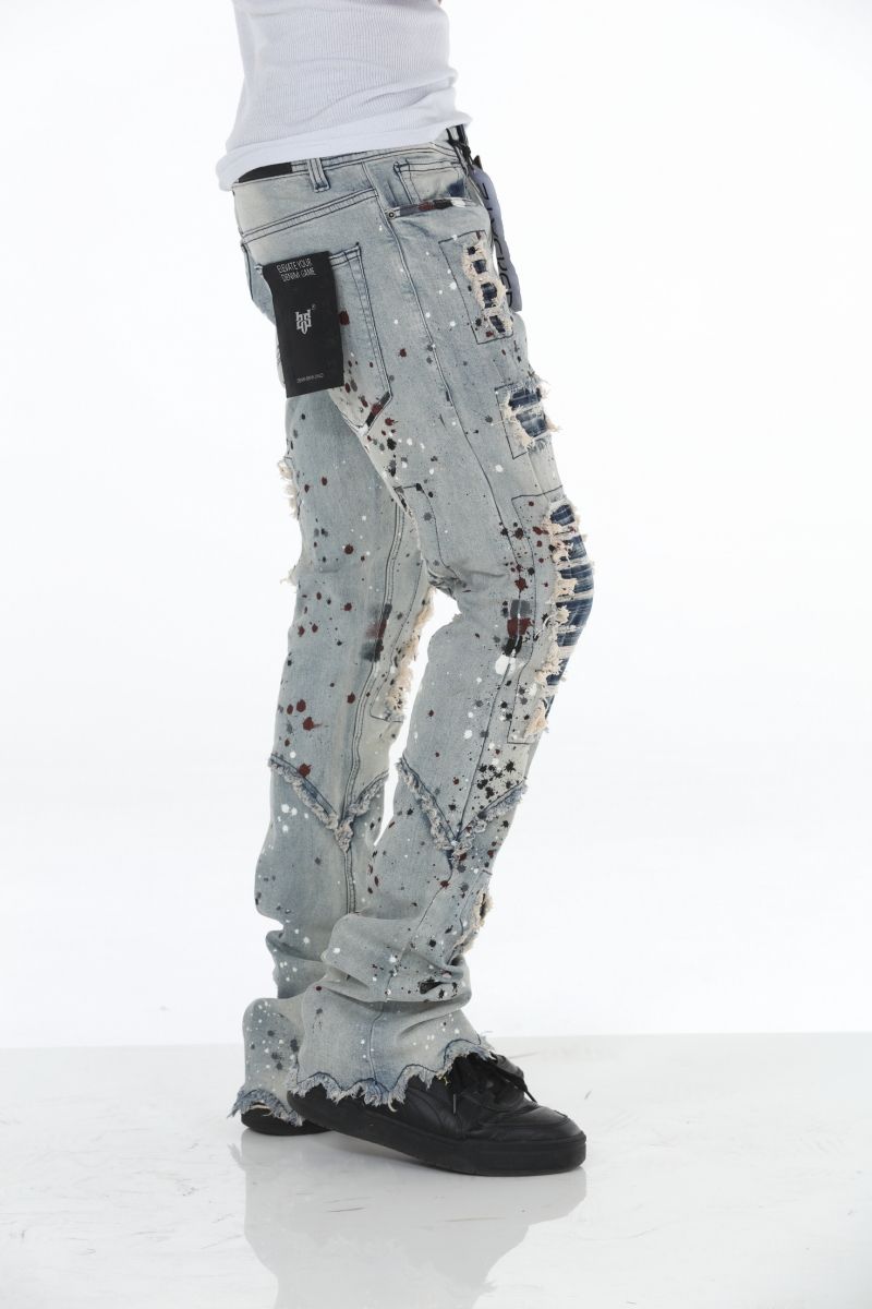 Light blue denim with paint splatter and ripped details by Stylo