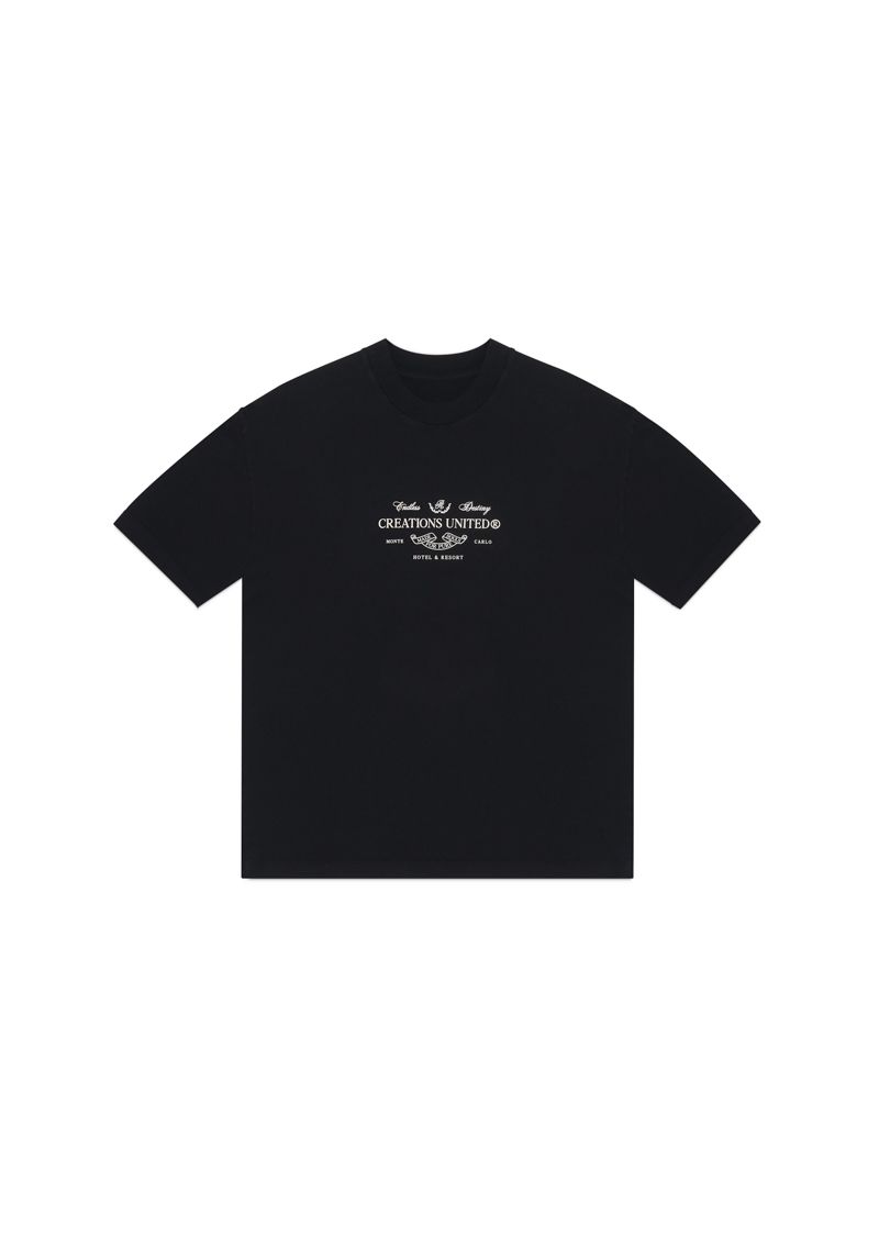 Zoomed-in view of the neckline and stitching of the PURE Monclair Black Tee emphasizing craftsmanship