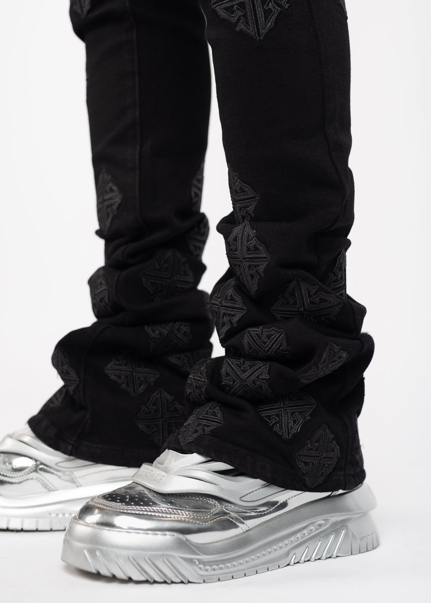 Guapi All Black Icon Stacked Denim Jeans in a trendy and versatile black color, perfect for any occasion