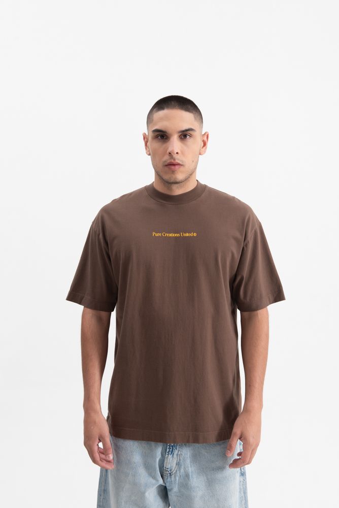 Front view of the PURE Knockout Script Brown Tee highlighting the oversized fit