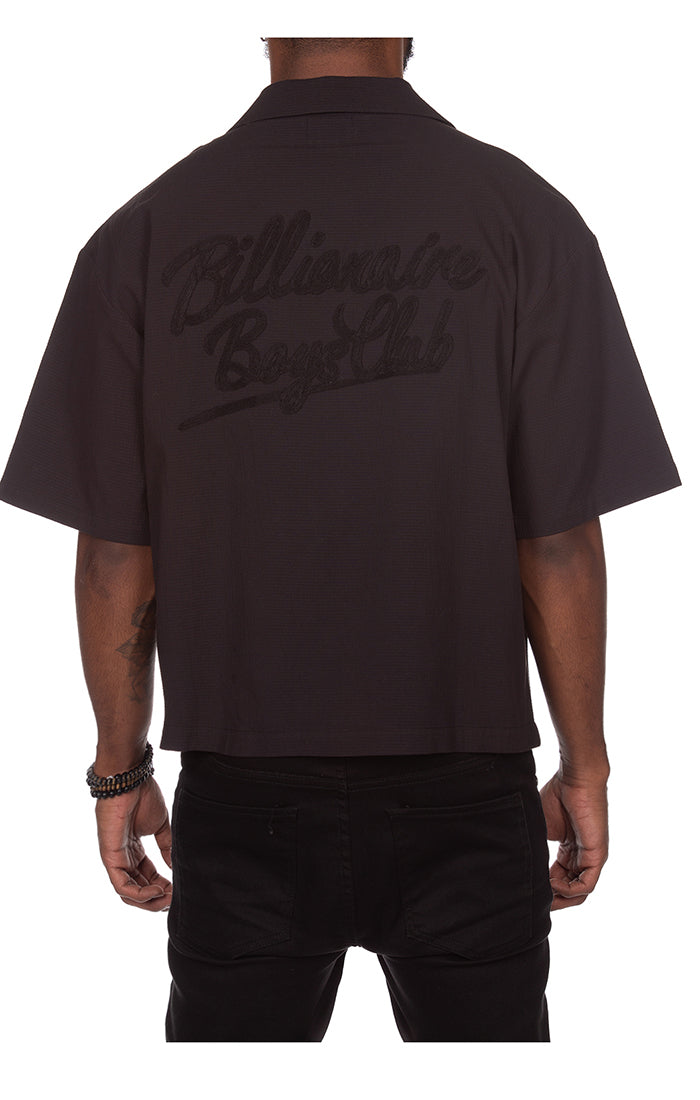 Stylish BBC Black BB Cabana SS Woven Button Up shirt on hanger with vibrant print and short sleeves