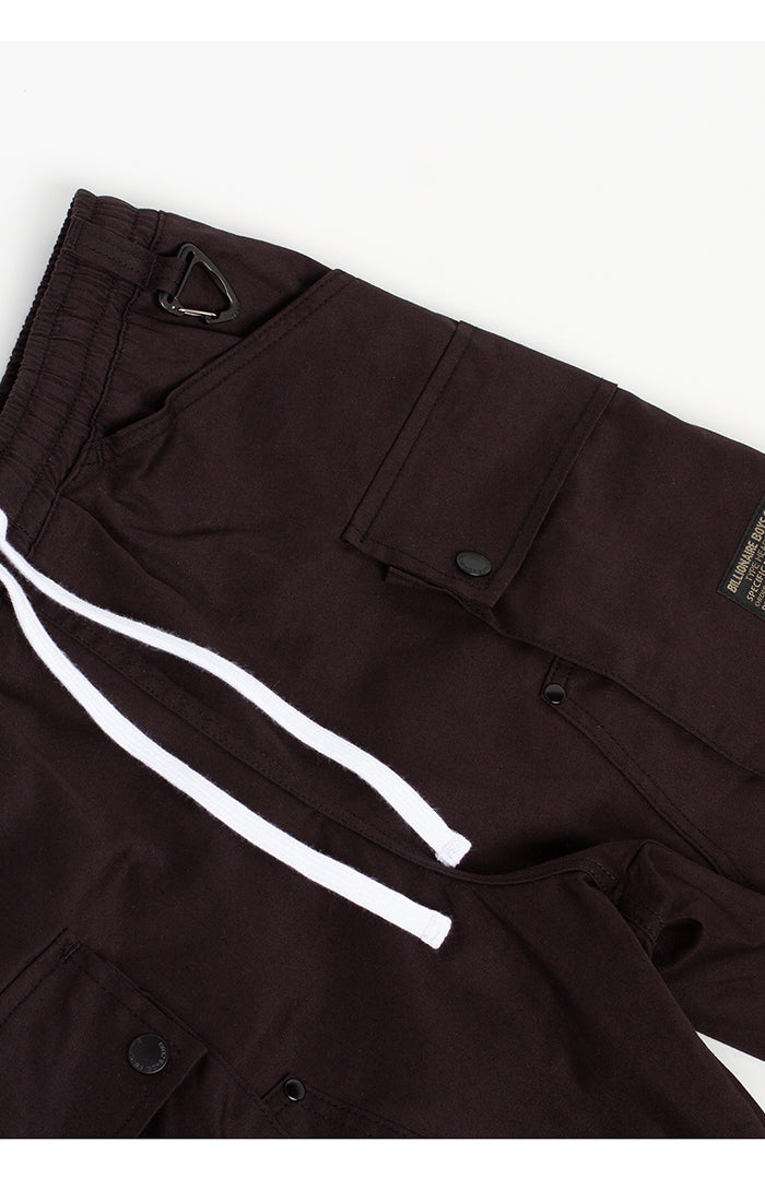 Side profile highlighting the utility pockets and straight leg design of the BBC Black Cargo Pants