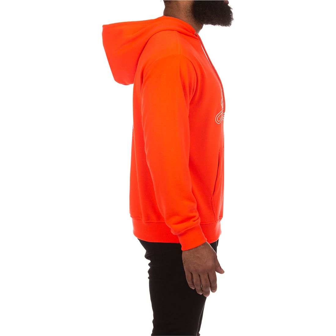 Model wearing neon coral hoodie with relaxed fit and ribbed cuffs