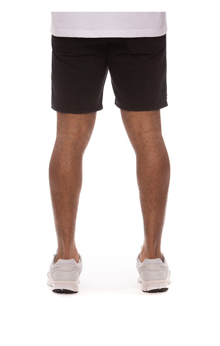 Front view of Ice Cream Black Dog Black Caramel Jean Shorts highlighting the unique style and fit designed for comfort and fashion