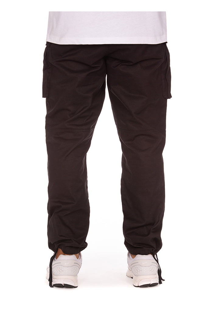 Front view showing the relaxed fit and adjustable waistband of the BB Flagship Core Cargo Pants