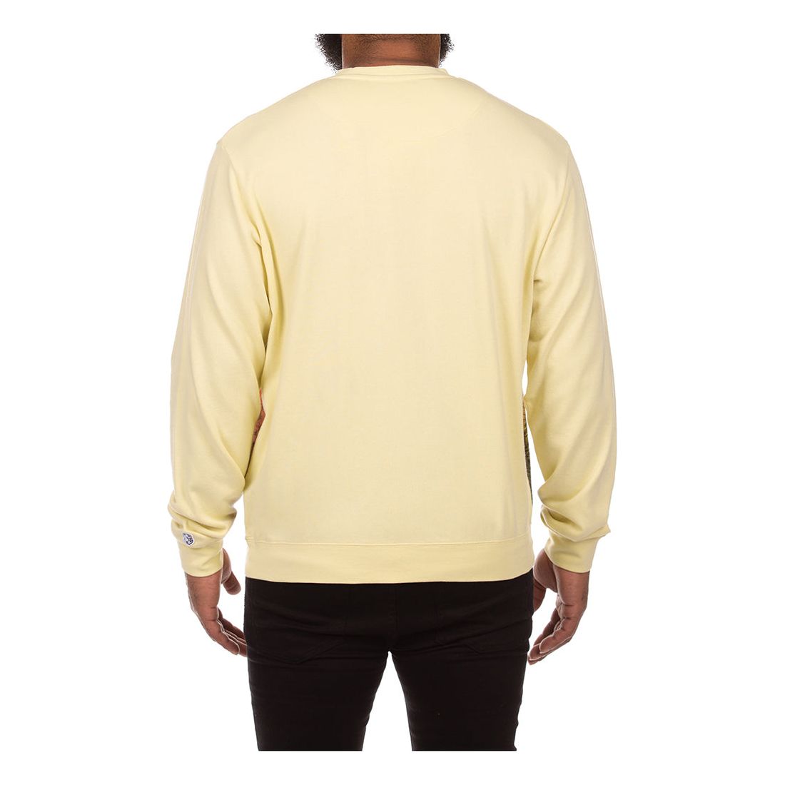 Model wearing BBC Wax Yellow BB Free Crewneck in a casual street style outfit