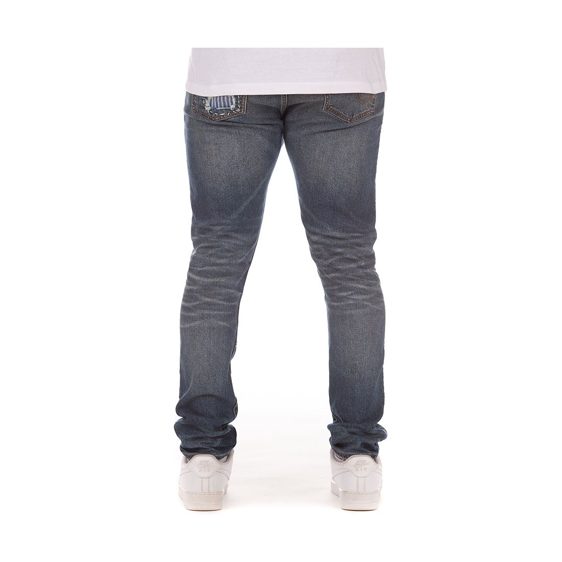 Close-up of Reduce Reuse Blueberry Haze Repair Jean fabric texture with intricate stitching and distressed details