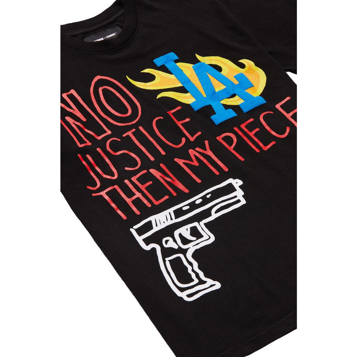 Homme + Femme LA Riots Black Tee styled with ripped jeans and sneakers