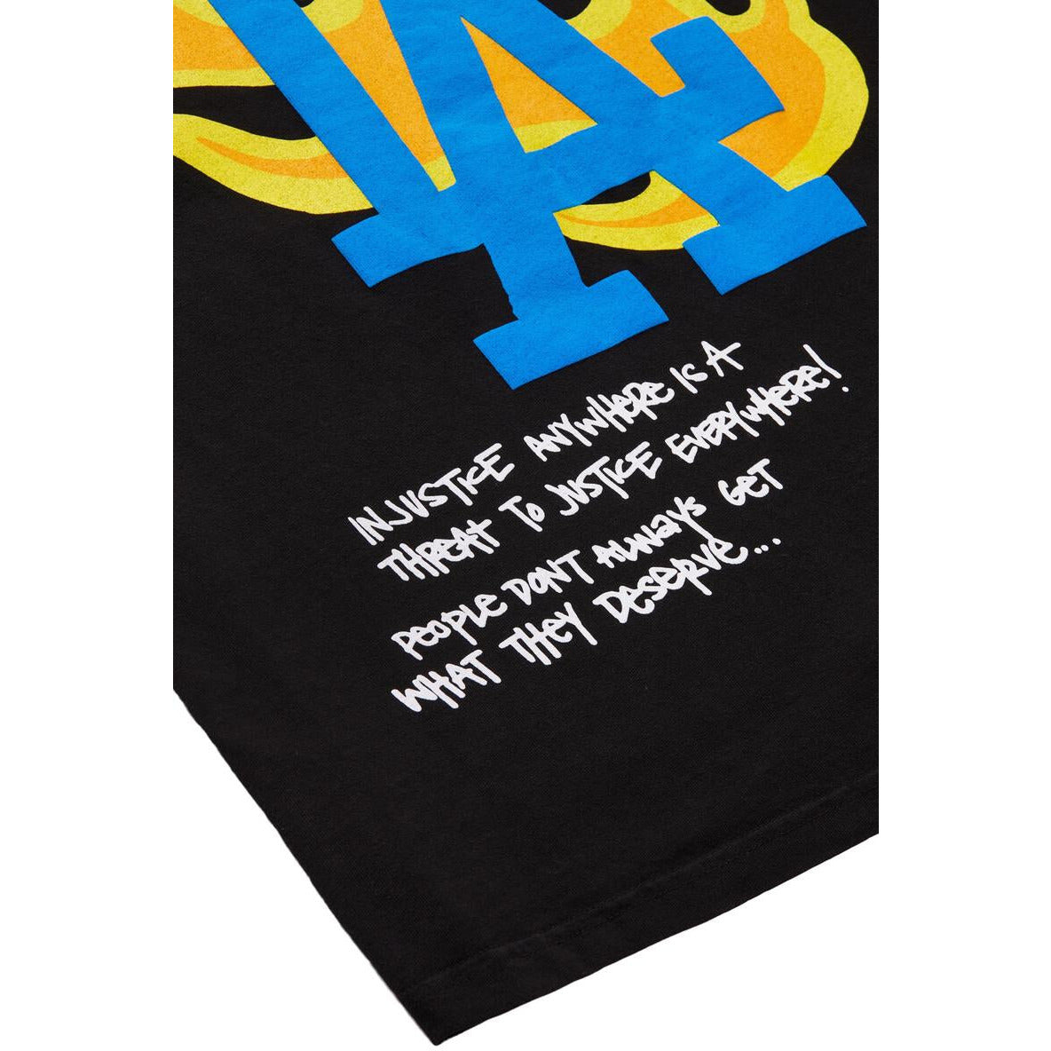 Black unisex t-shirt featuring 'Homme + Femme LA Riots' logo design