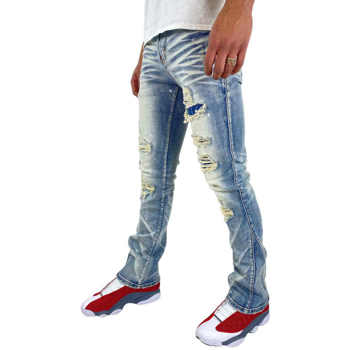 Side view of a model wearing the Preme Indigo Denim - Niagra Flare (PR-WB-936) jeans, showcasing the flattering flare silhouette