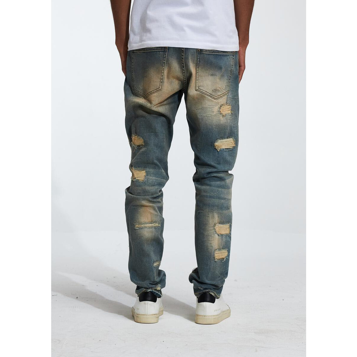 Back view of Embellish Gemdale Sand Wash Denim jeans with logo patch