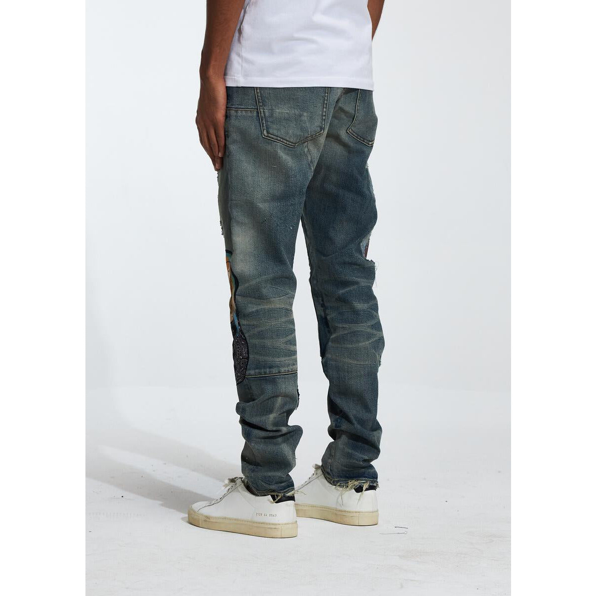 Embellish Campberg Ripped Denim Jeans (EMBF222-6) on a model, showcasing the fit and style