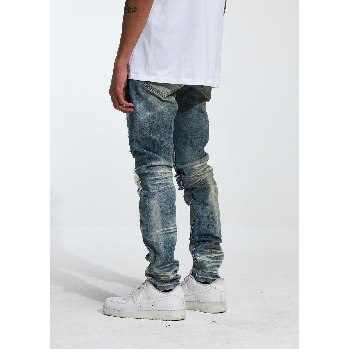 Close-up of the CRYF222-208 jeans' unique light indigo wash