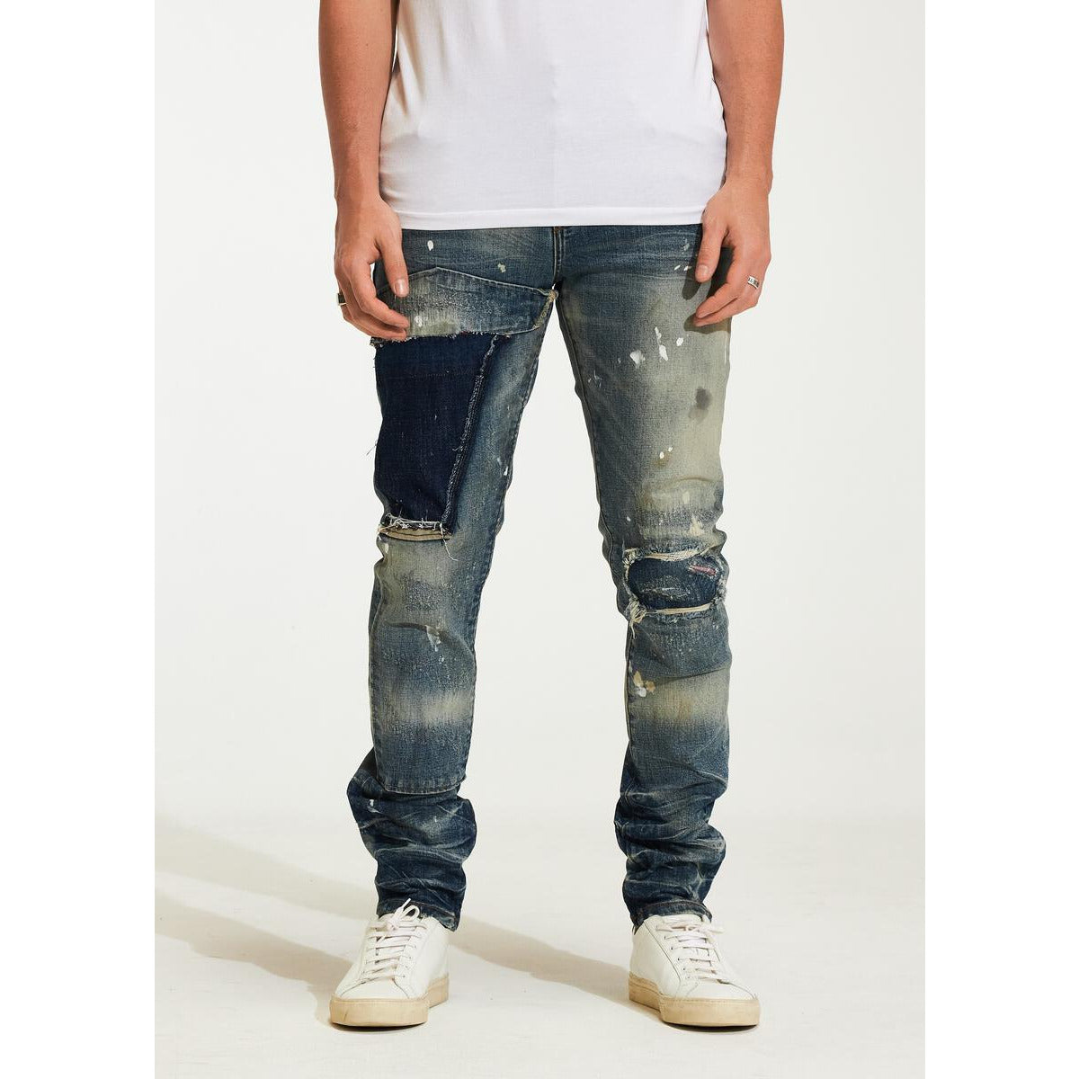 Close-up of Embellish Creed Indigo Ripped Jeans showing distressed detail