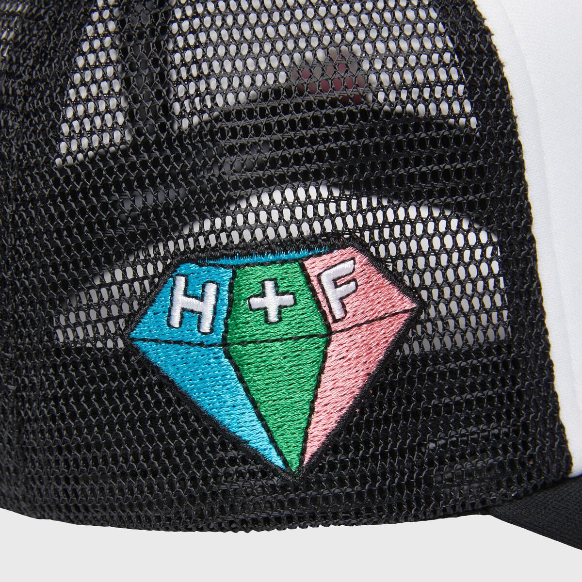 Unisex Beverly Hills trucker hat in black and white with a prominent patch and multi-colored diamond accent on the right panel