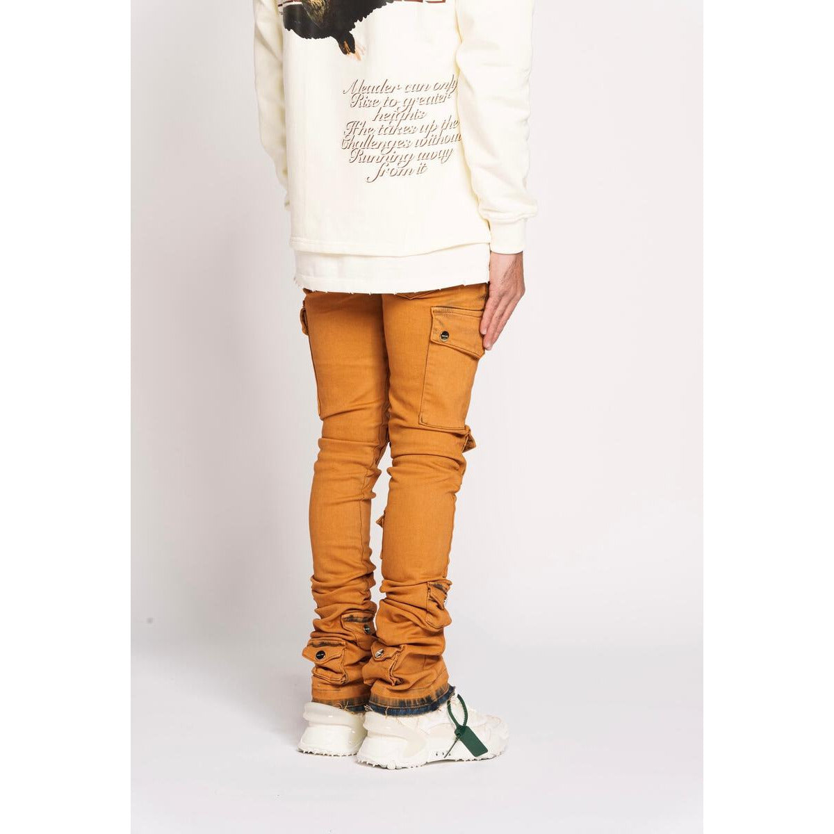 PHEELINGS My Pleasure Dark Orange Cargo Flare Stack Denim paired with white t-shirt and sneakers for a casual look