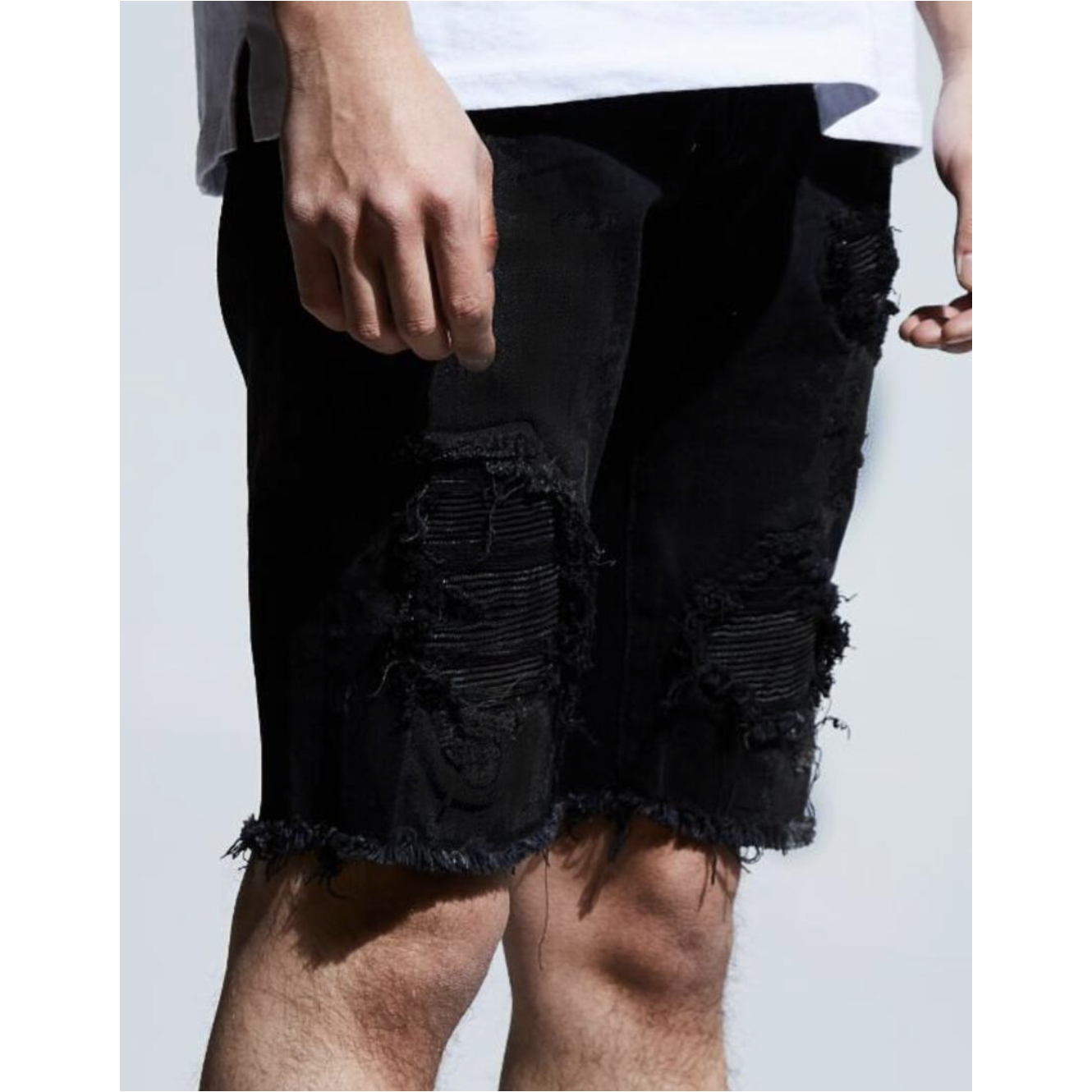 Stylish and versatile black denim EMBSPNCR-SHRT with edgy rip and repair details