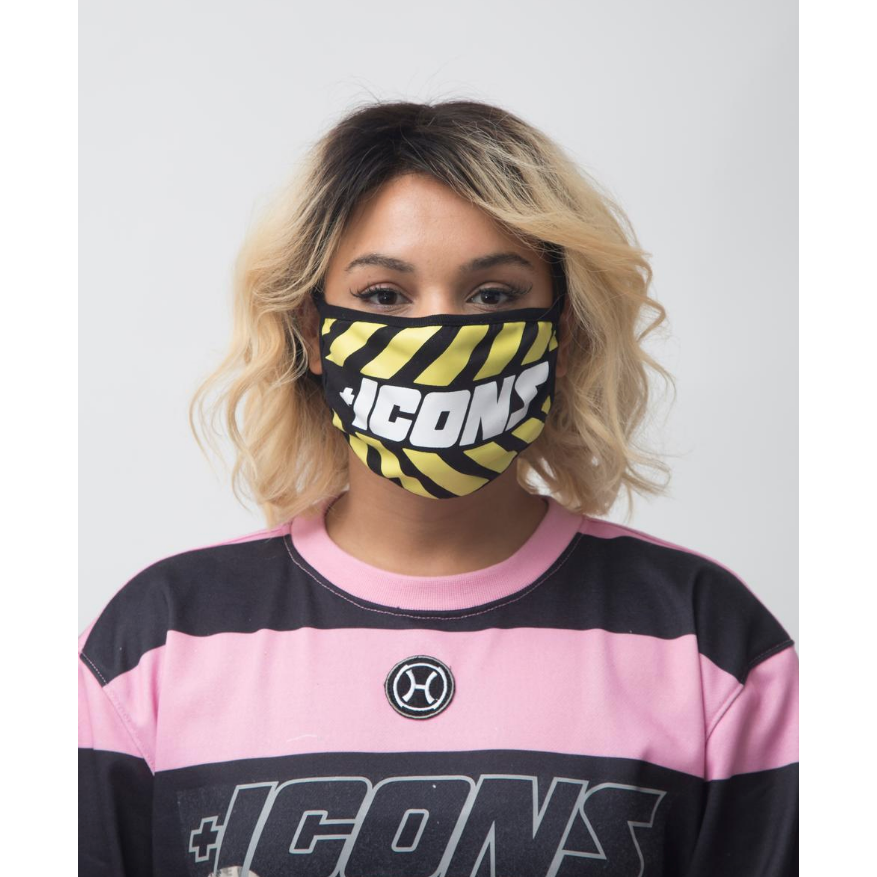 Close-up image of Hudson ICONS Face Mask Yellow, a trendy and protective accessory for everyday wear, made with high-quality materials and vibrant yellow color