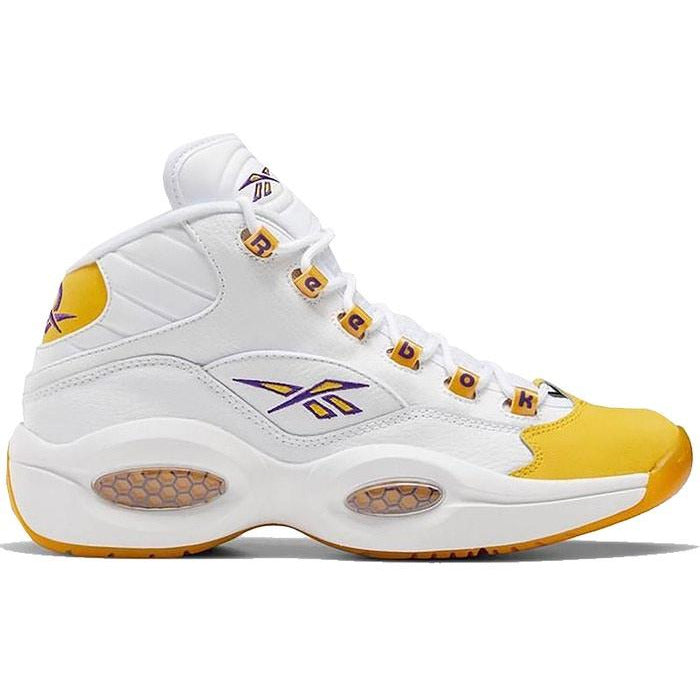 High-top basketball sneakers in yellow and white with signature Reebok branding