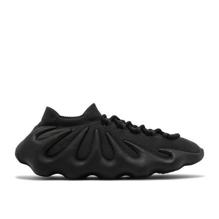 Highly sought after adidas Yeezy 450 - Dark Slate sneaker, featuring innovative design and sleek, dark colorway