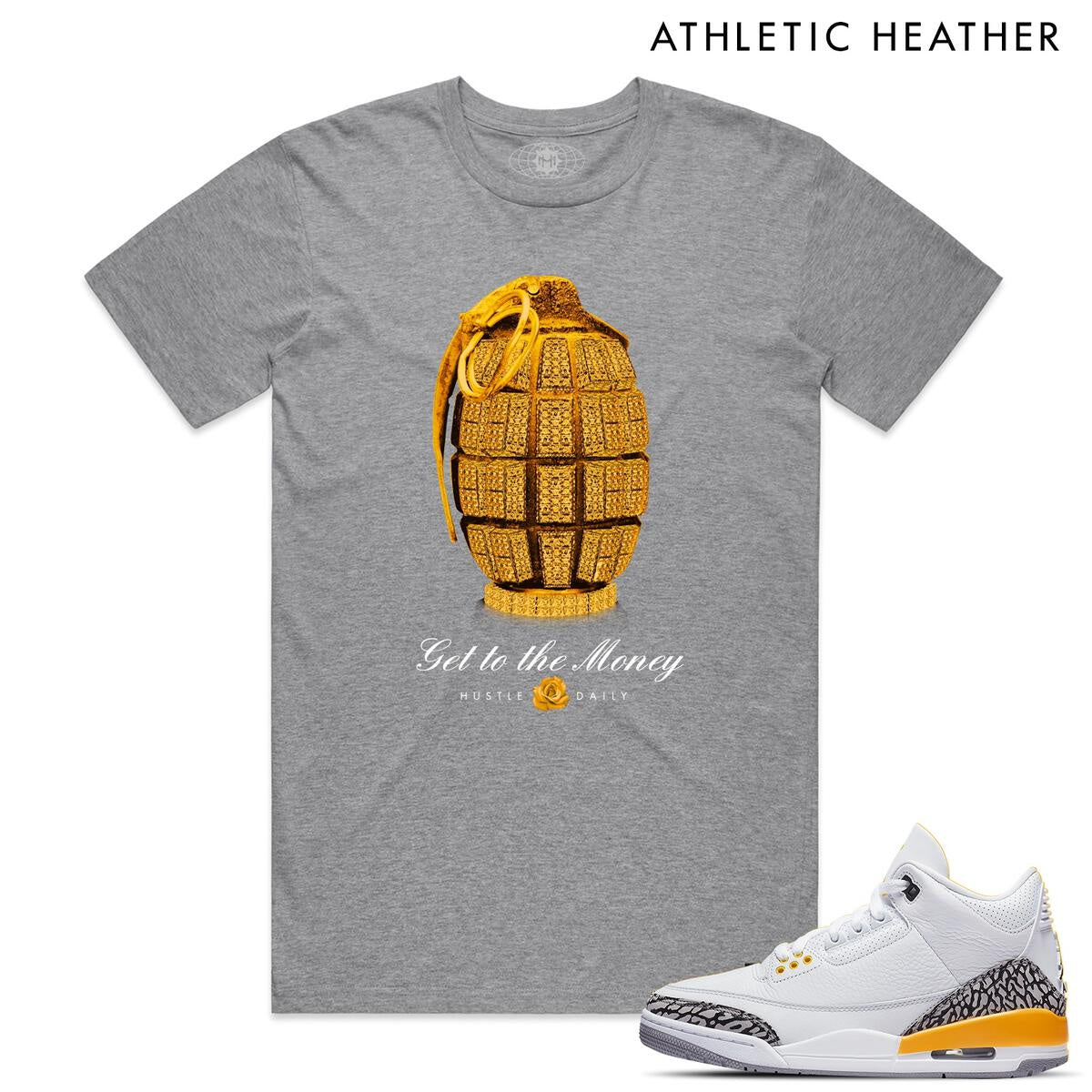 Alt text: Heather grey tee with 'Hasta Muerte Gold Grenade' design, a stylish and edgy addition to any wardrobe
