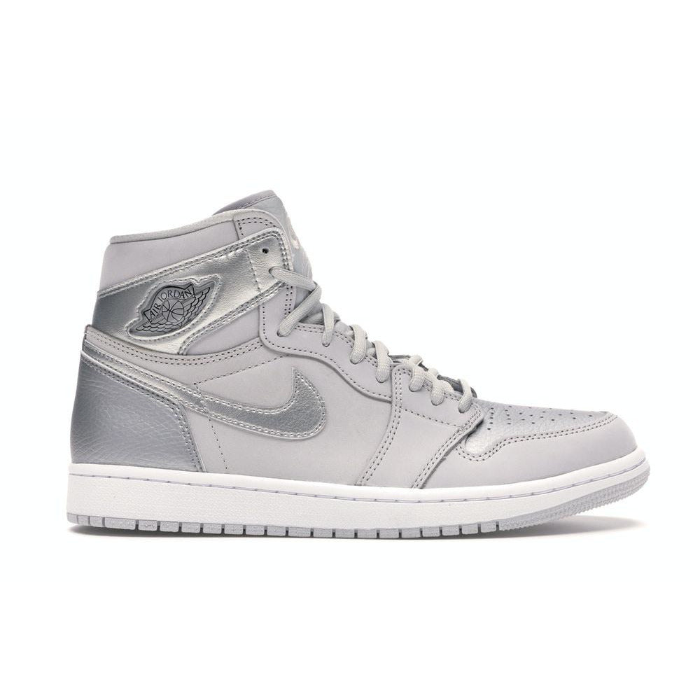 Close-up of the Jordan 1 Retro High - CO Japan Neutral Grey (2020) sneakers, featuring a neutral grey colorway and classic high-top silhouette, perfect for sneaker enthusiasts and collectors