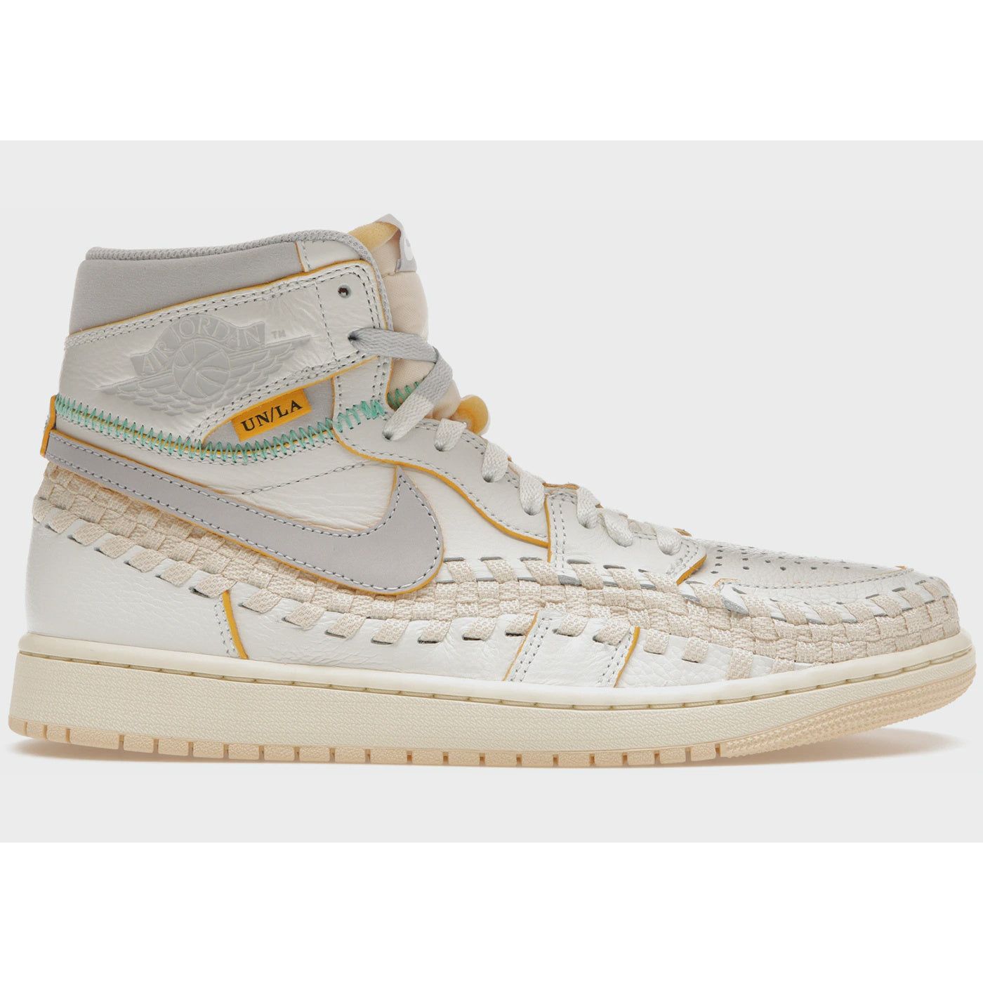 Close up image of the Jordan 1 Retro High OG SP - Union LA Bephies Beauty Supply Summer of 96' sneakers, featuring a mix of white, blue, and red colors with a Union LA tag