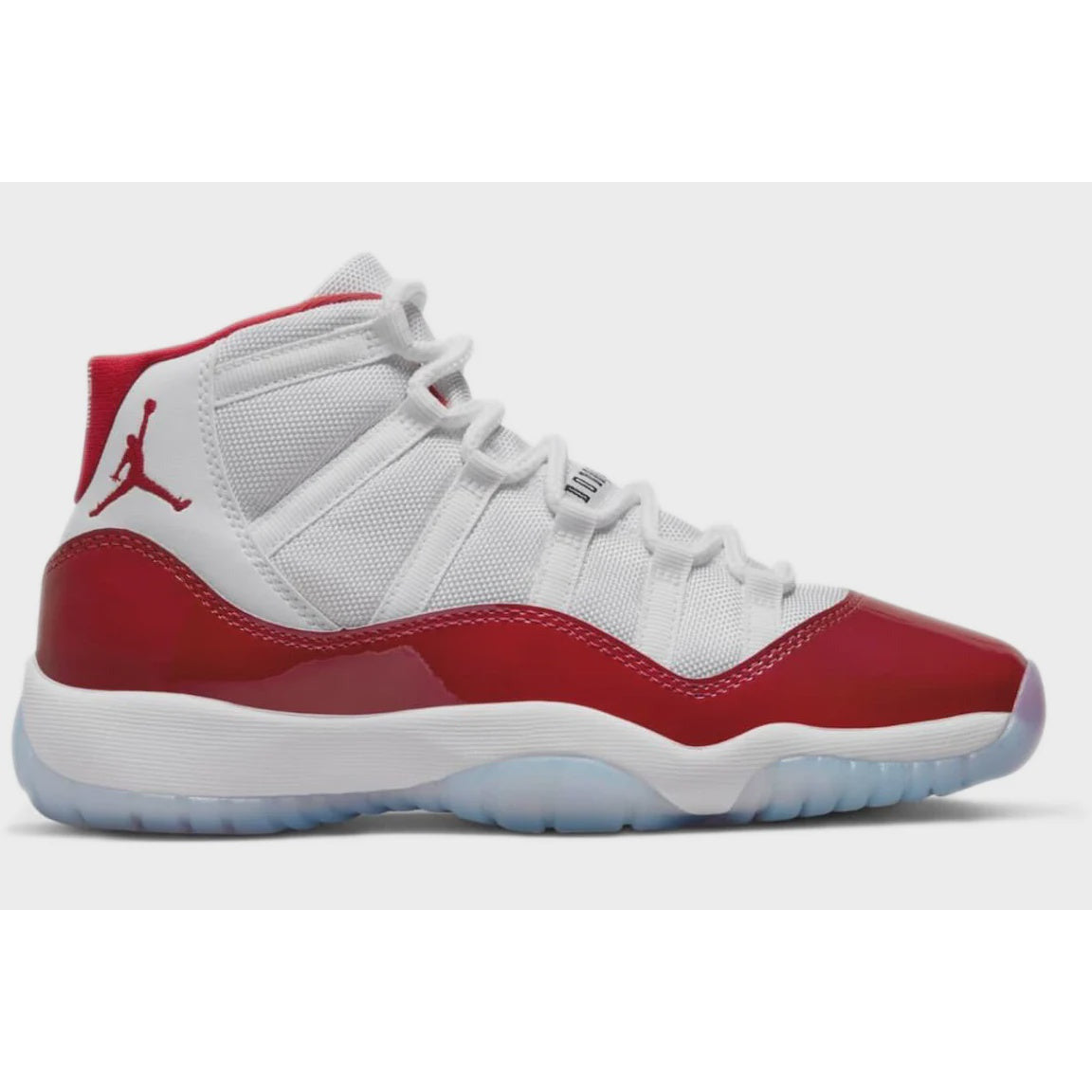 High-quality image of the Jordan 11 Retro High - Cherry (GS) (2022) (378038 116) sneakers, featuring red and white colorway, perfect for sneakerheads and basketball enthusiasts