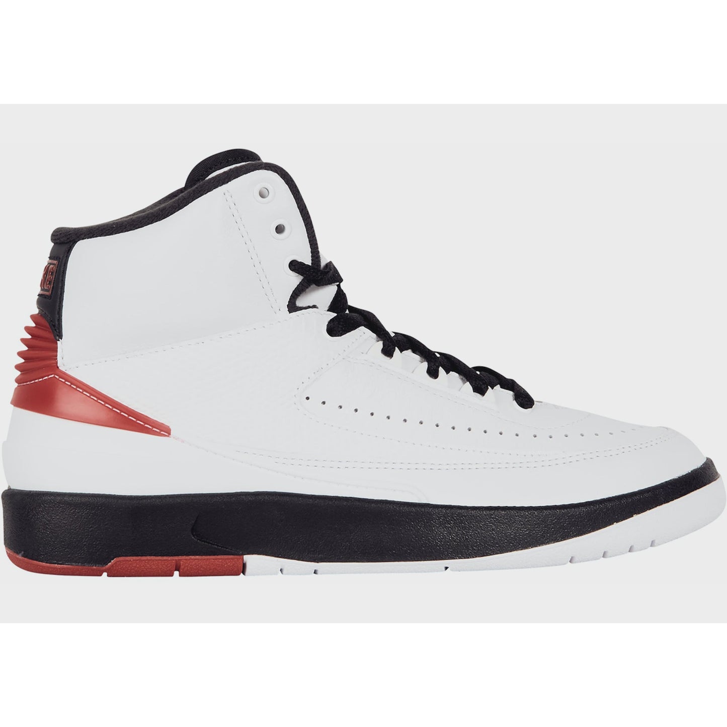 High-top white and red Jordan 2 Retro OG Chicago 2022 sneakers for kids