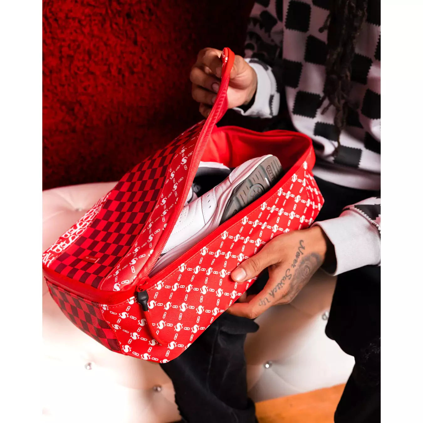 Fashionable and functional red sneaker bag with bold design and durable material