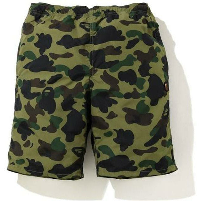 Green BAPE 1st Camo Beach Shorts from the SS20 collection, perfect for summer lounging and beach days