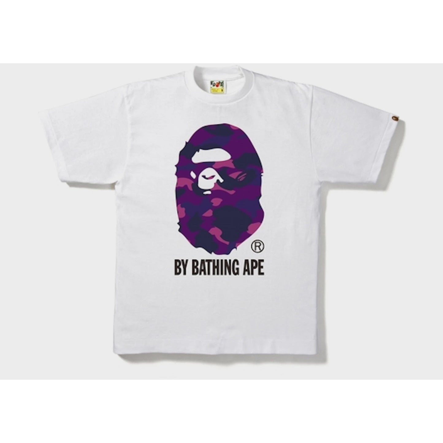 A brand new white and purple BAPE Color Camo By Bathing Ape T-shirt from FW22 with unique camouflage pattern and product code 1I80-110-014