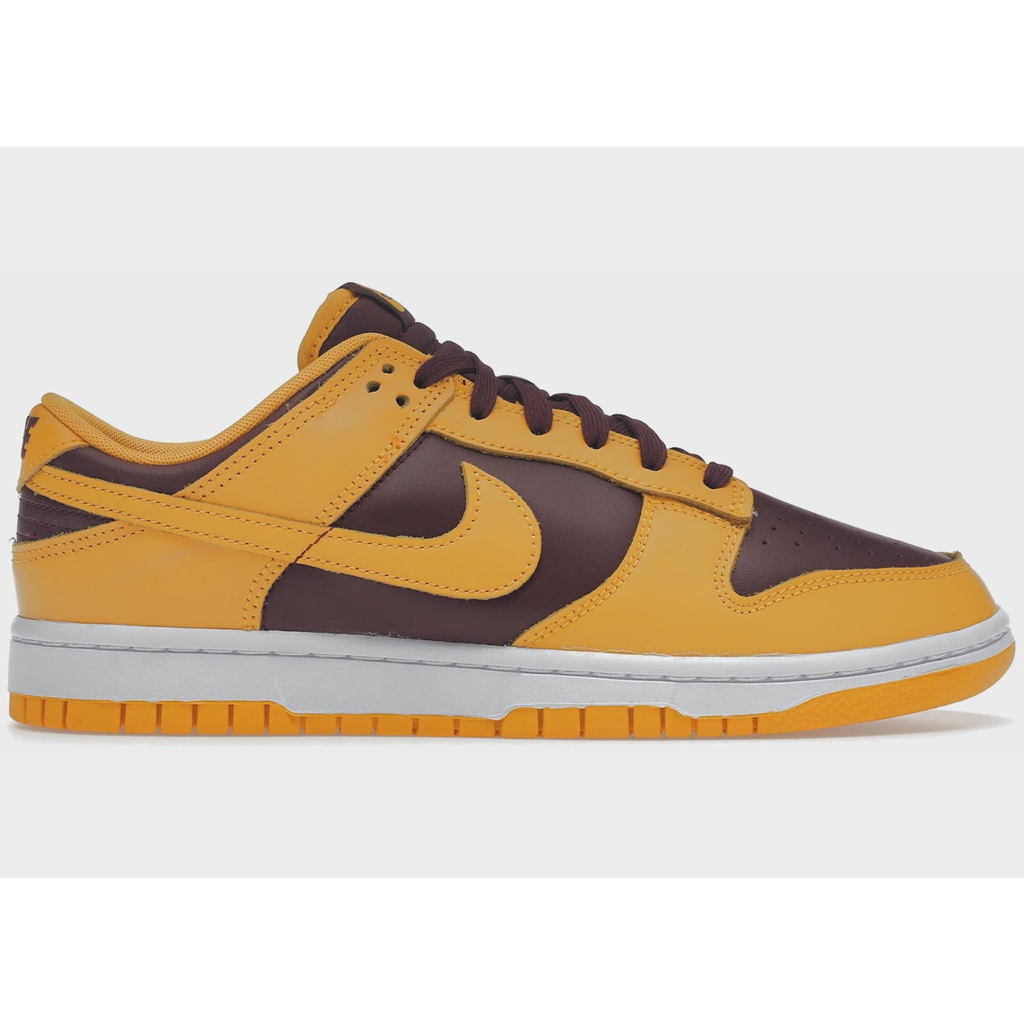 Nike Dunk Low - Arizona State (DD1391-702) sneakers in vibrant gold and maroon colorway with ASU logo on the heel