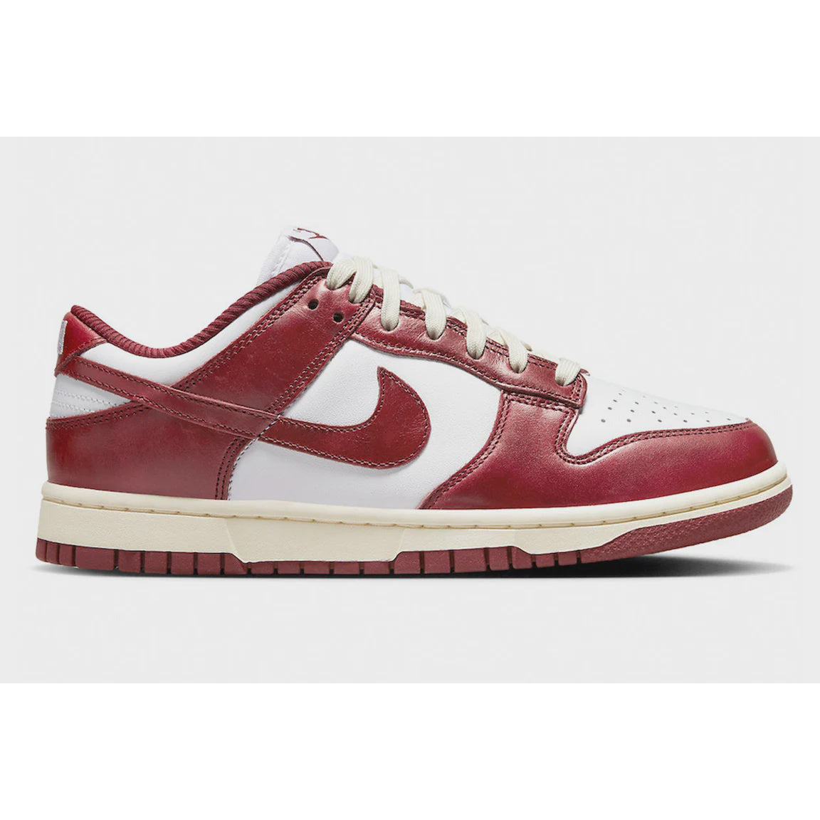 Nike Dunk Low PRM - Vintage Team Red (W) (FJ4555-100) women's sneakers in classic vintage red colorway with premium materials and stylish design