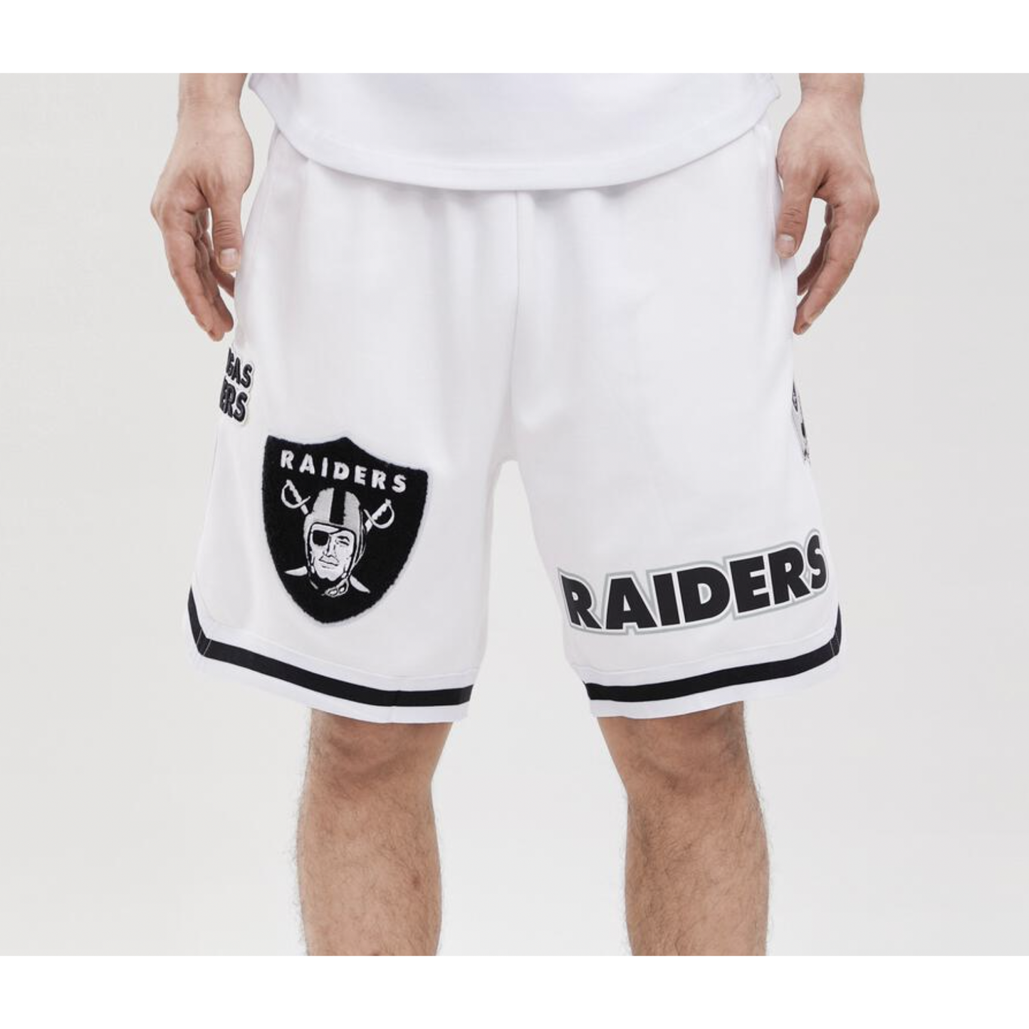 White Las Vegas Raiders logo shorts with Pro Team branding for sports enthusiasts