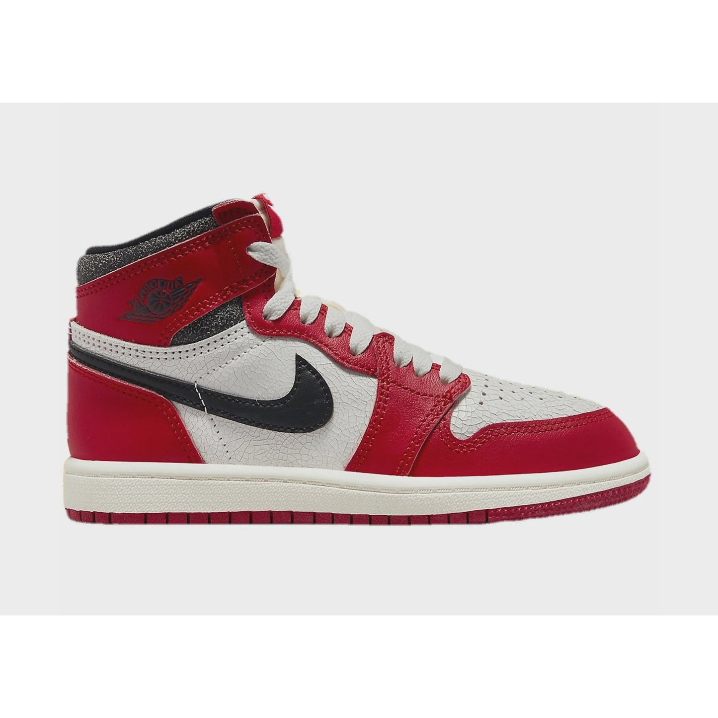 Red and white Jordan 1 Retro High OG Chicago Lost and Found sneakers for kids