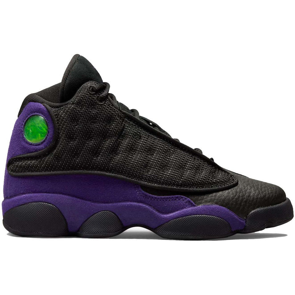 Close up of the Jordan 13 Retro - Court Purple (GS) sneakers, featuring a sleek and stylish design with purple accents and iconic Jordan branding