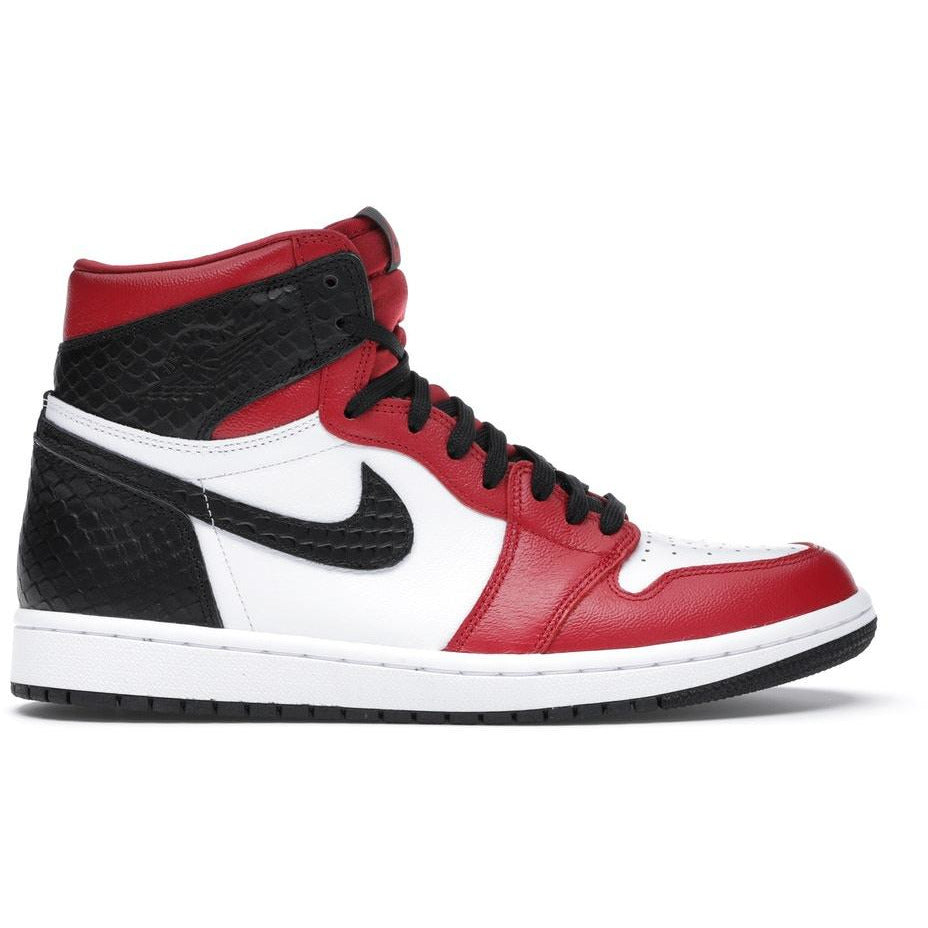 Stylish and sleek Jordan 1 Retro High - Satin Snake Chicago (W) women's sneakers with red, white, and black colorway and snakeskin texture