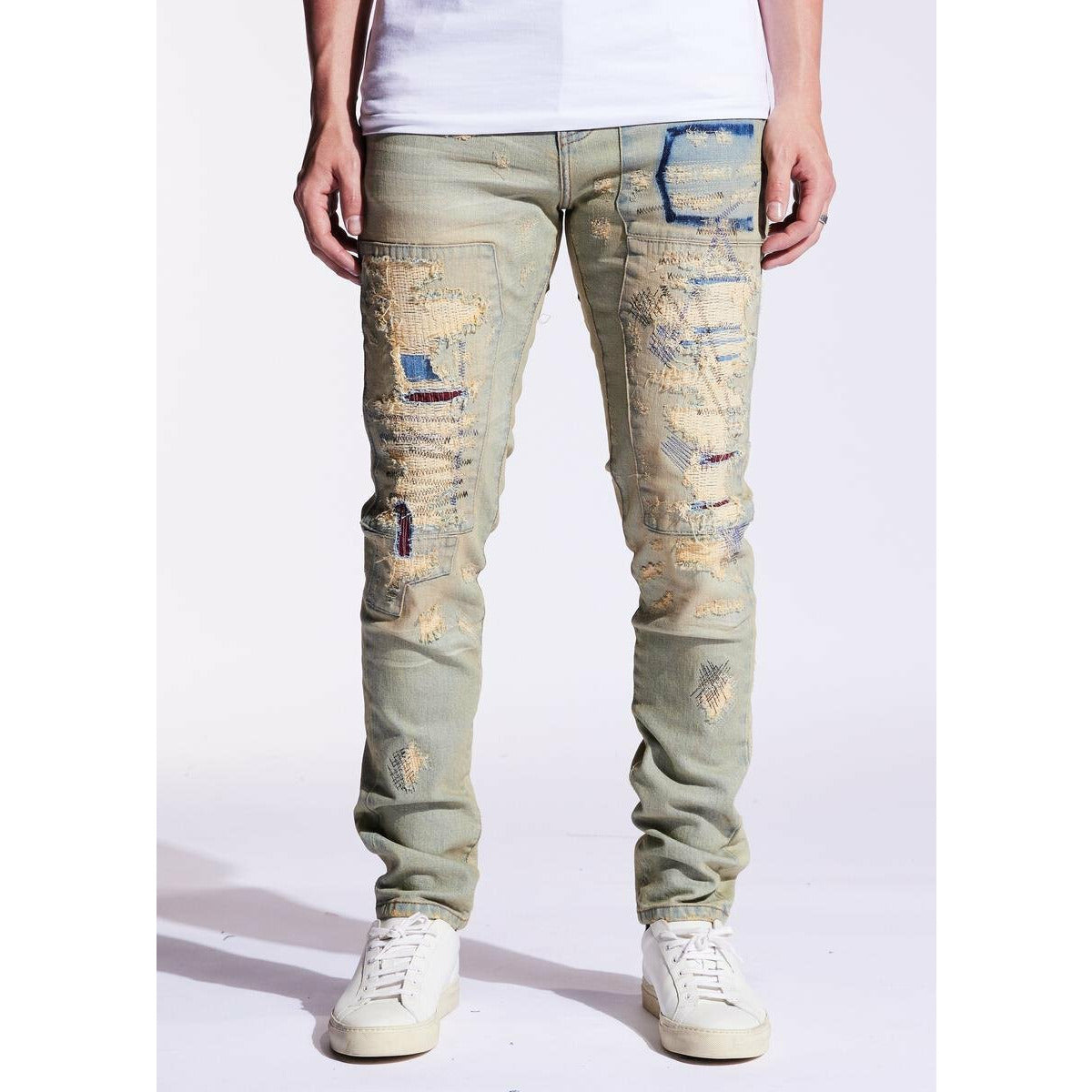 Front view of Embellish BARKER DENIM Washed Distressed jeans with distressed and repaired design
