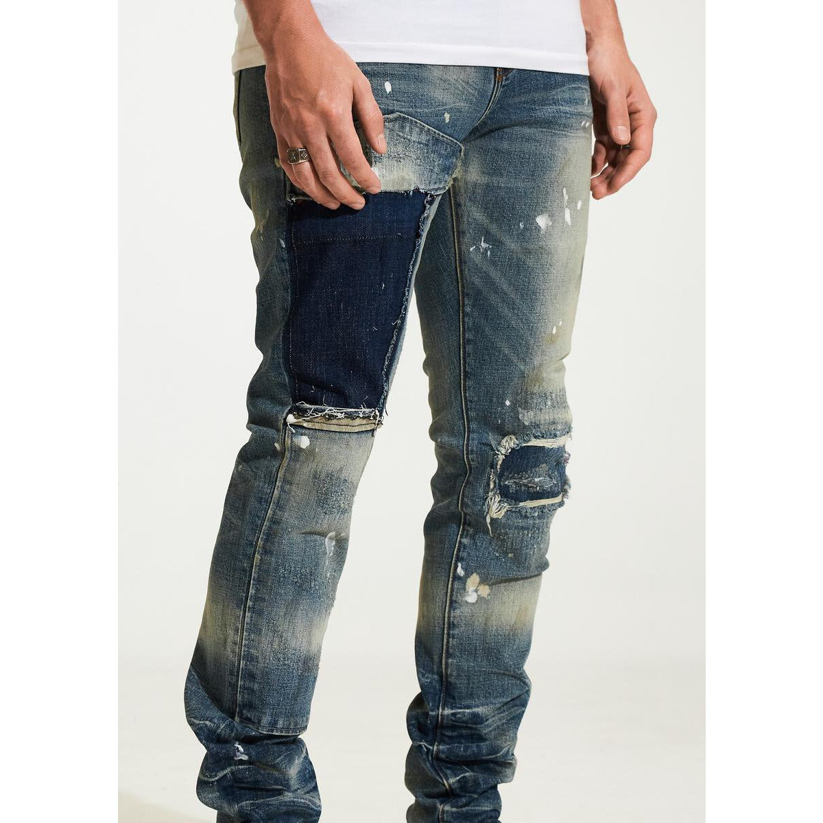 High-quality denim material of Embellish Creed Indigo Ripped Jeans with unique wash