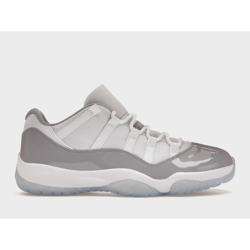 High-quality image of Jordan 11 Retro Low - Cement Grey (AV2187-140) sneakers, featuring iconic design and premium materials for a stylish and comfortable footwear option